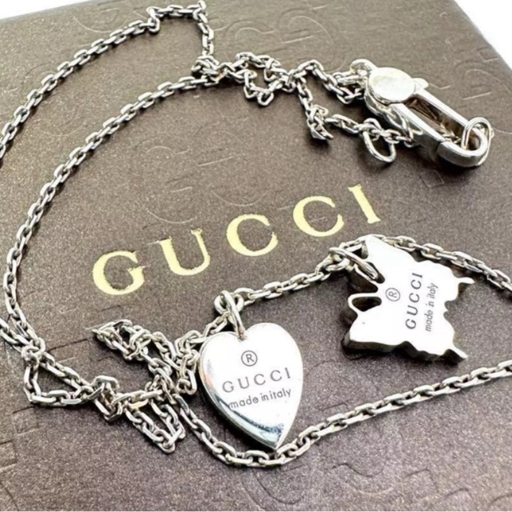 GUCCI Sterling Silver "Trademark" Heart and Butterfly Necklace, 18" chain .